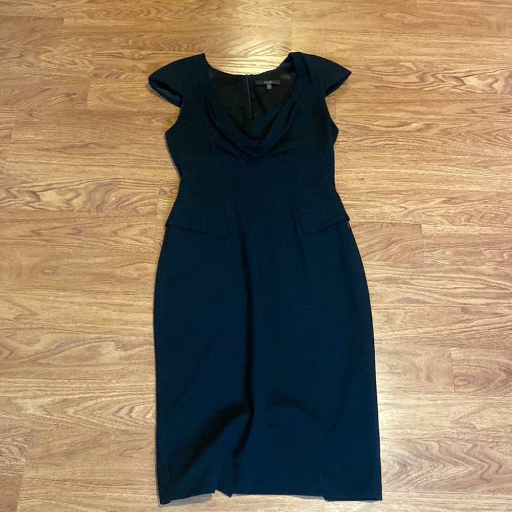 Single black fitted cowl neck dress with shoulder pads